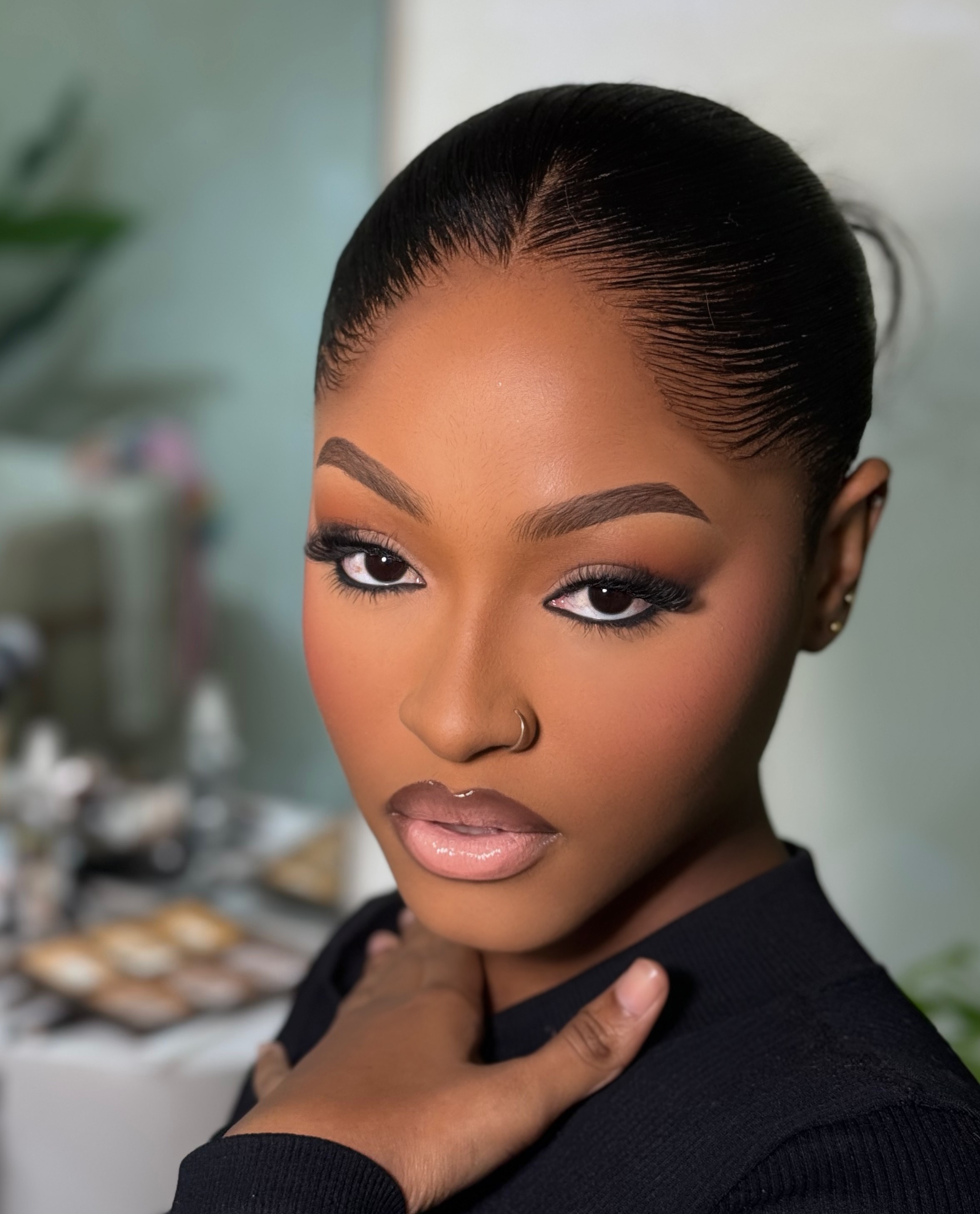 SKIN FIRST makeup on a Black Ghanaian woman